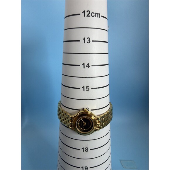 Vintage Gruen Quartz Ladies Gold Tone Black Dial Dainty Elegant Watch Runs Great